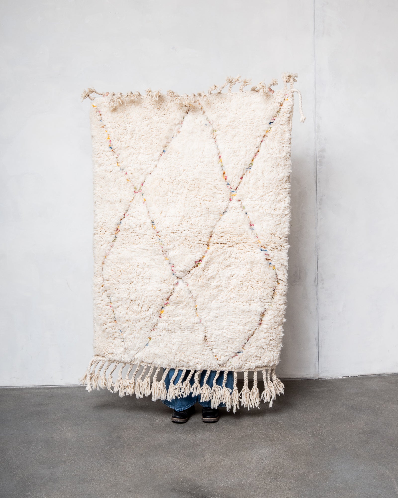 Modern, designer, handcrafted Berber rug from Morocco. Beniourain carpet with beautiful colours and patterns and fluffy wool texture.